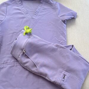 Figs Lavender Scrub set pants and top .
